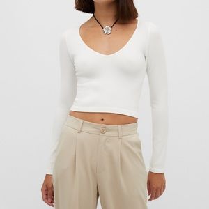 White V-neck long-sleeve top